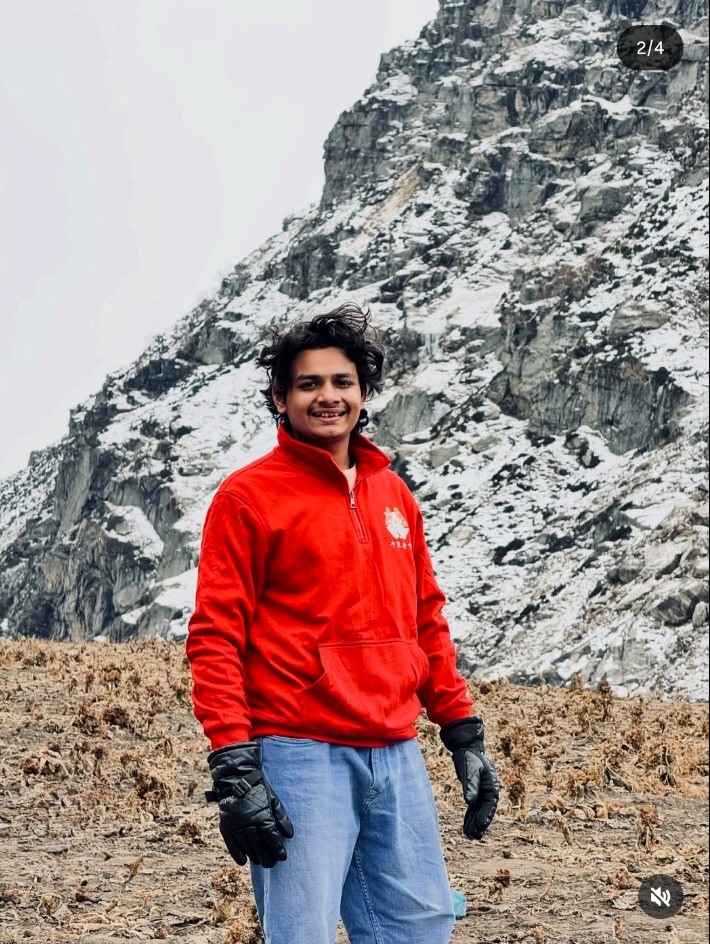 Neel Sharma in a mountain landscape